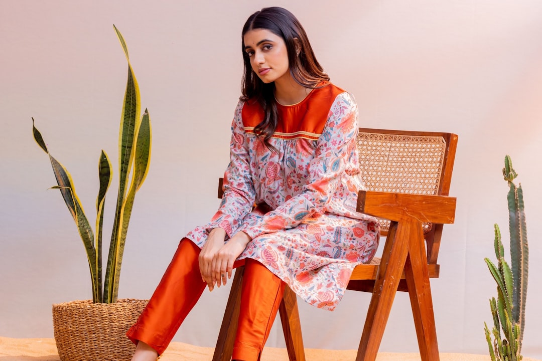 about-02 A modern ethnic fusion ensemble by Zlaata Fashion, featuring a Rust Orange Floral Print Kurta paired with elegant straight pants. Crafted for comfort and style, this 2-piece set blends traditional charm with contemporary design—ideal for festive occasions, casual elegance, or standout everyday wear. Discover more styles at zlaata.com